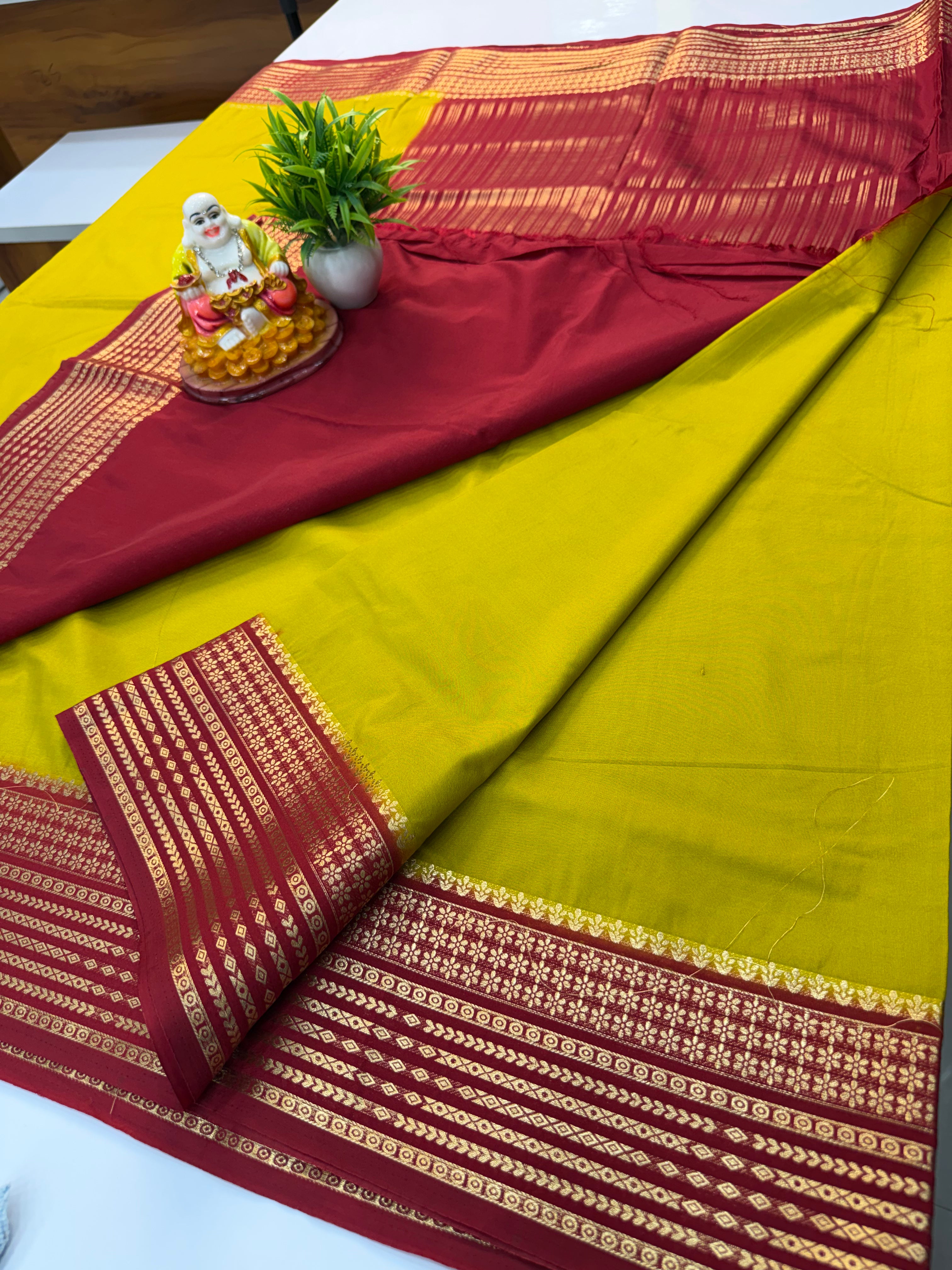 Mysore Crepe Silk Saree with Contrast Border – Elegant & Timeless  Product Description: