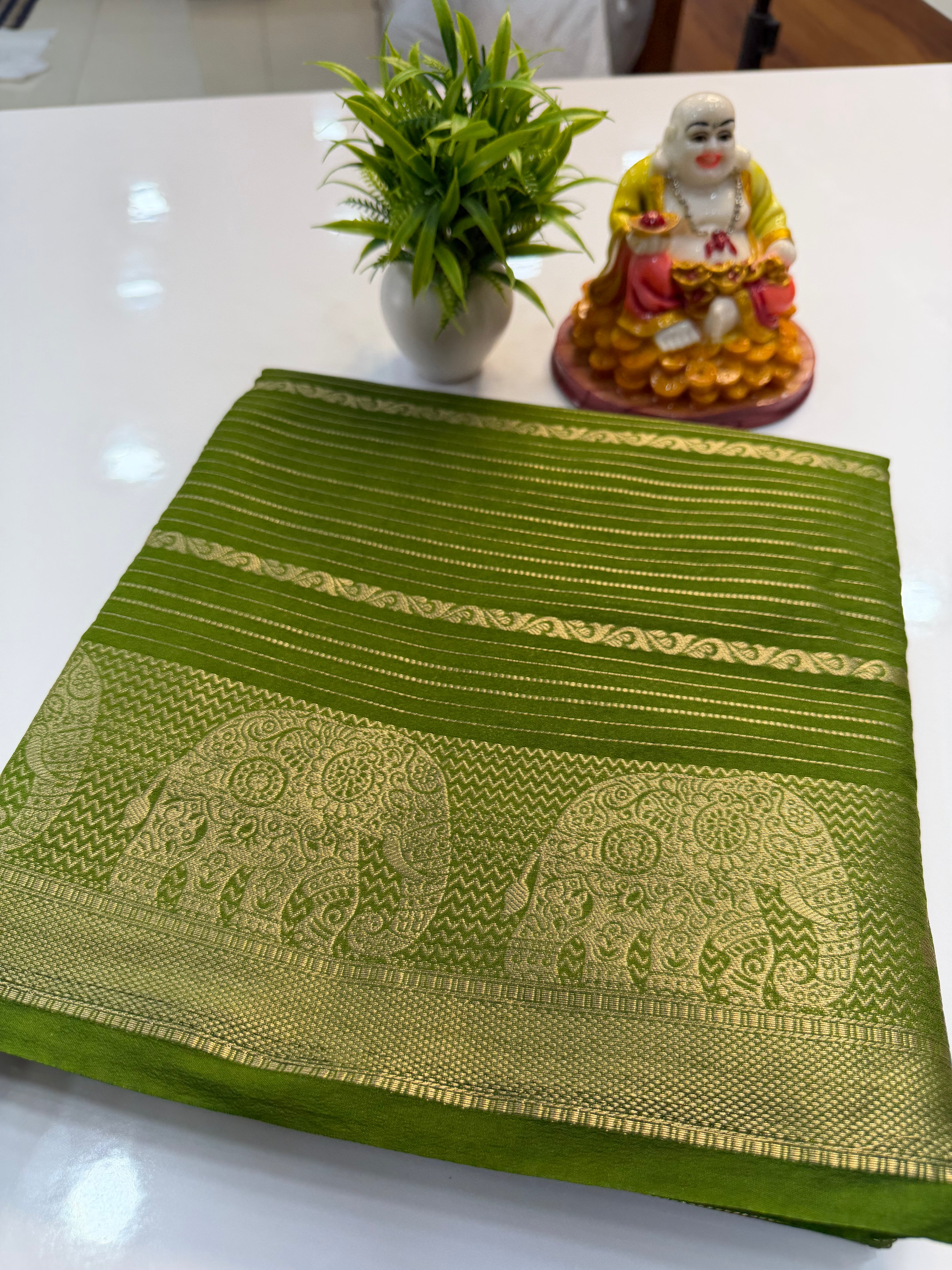 Mysore Crepe Silk Saree with Elephant Border – Shopify Product Description