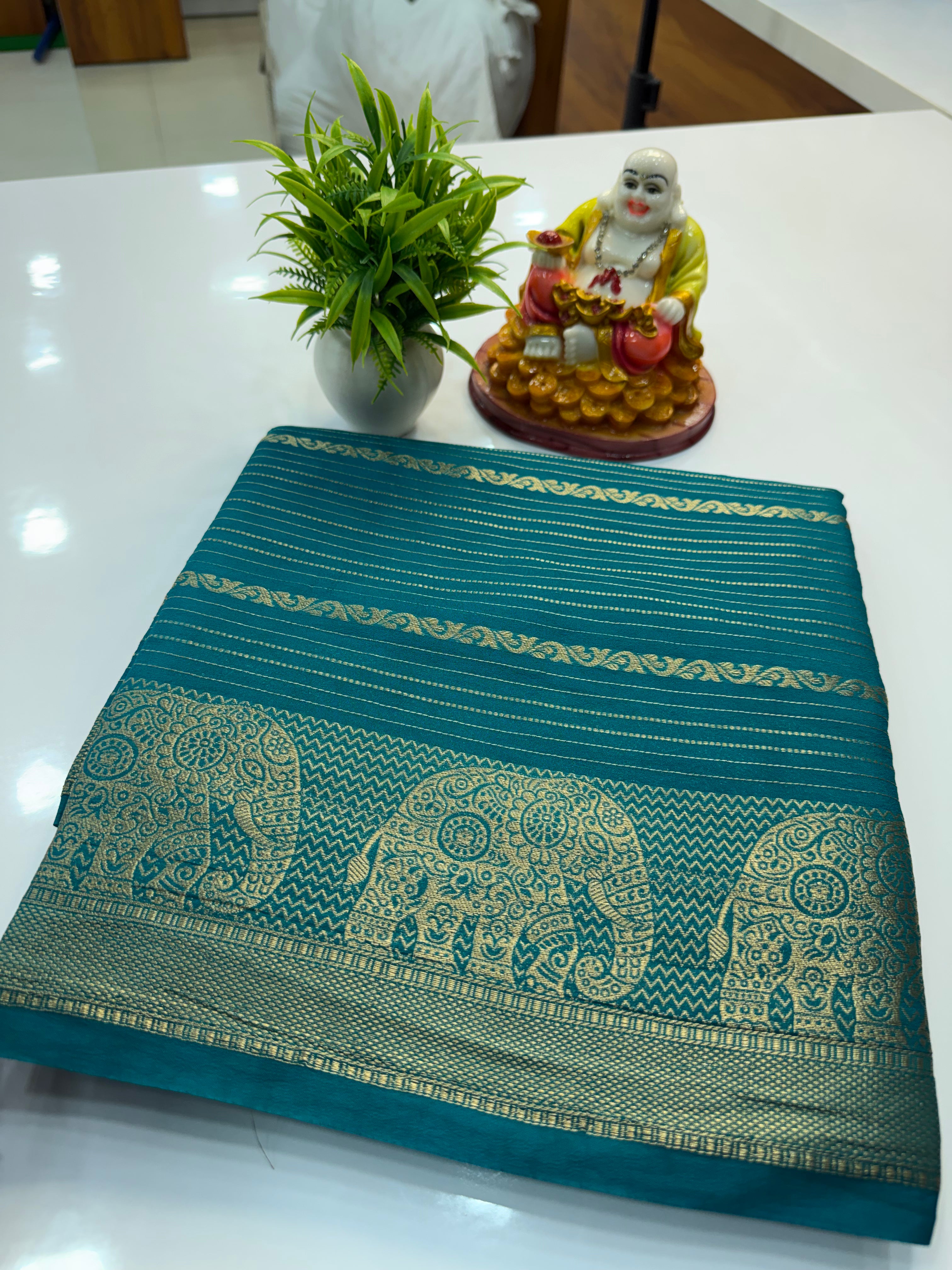 Mysore Crepe Silk Saree with Elephant Border – Shopify Product Description