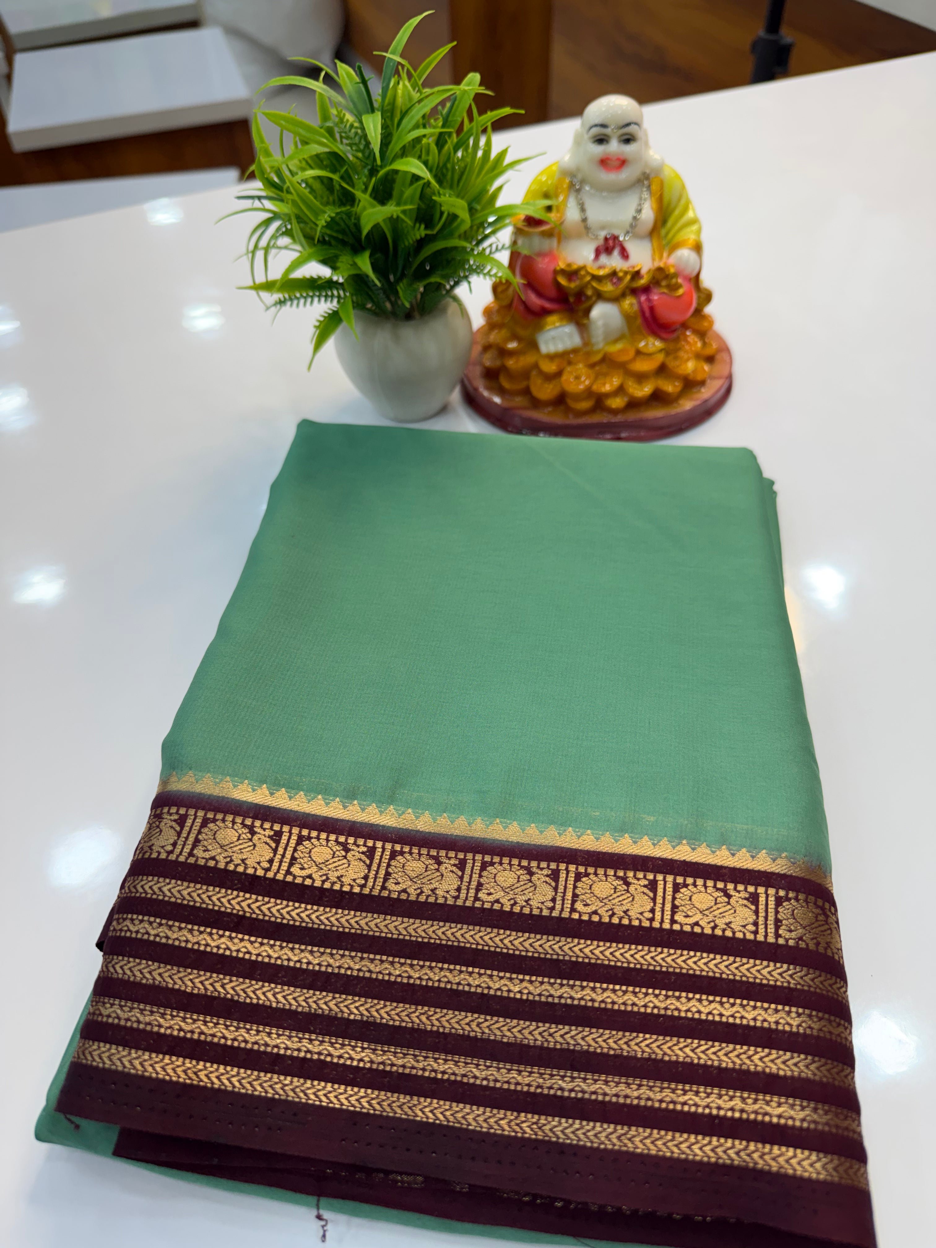 Mysore Crepe Silk Saree with Peacock Border – Shopify Product Description