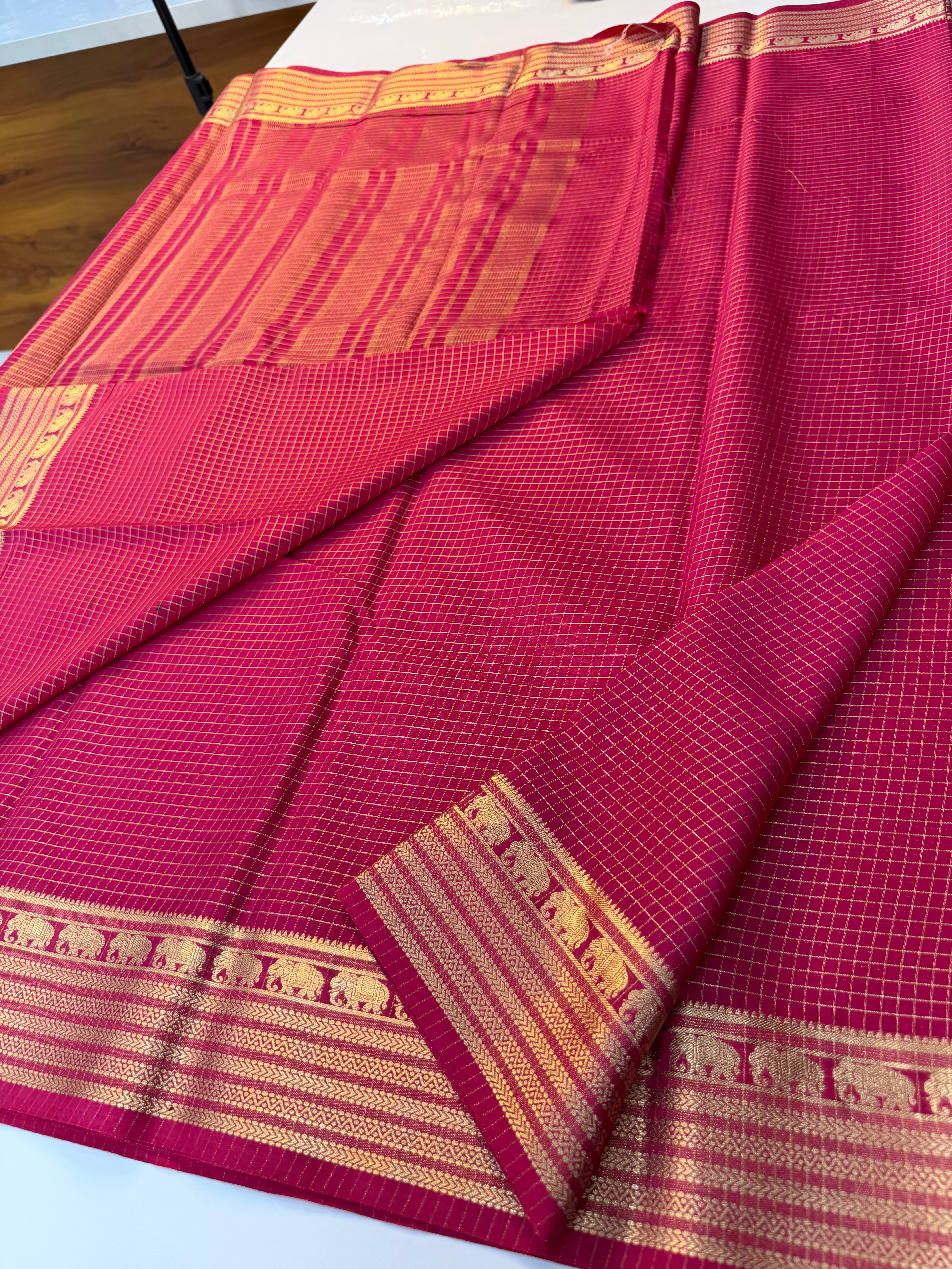 mysore crape silk saree with checks and elephant border