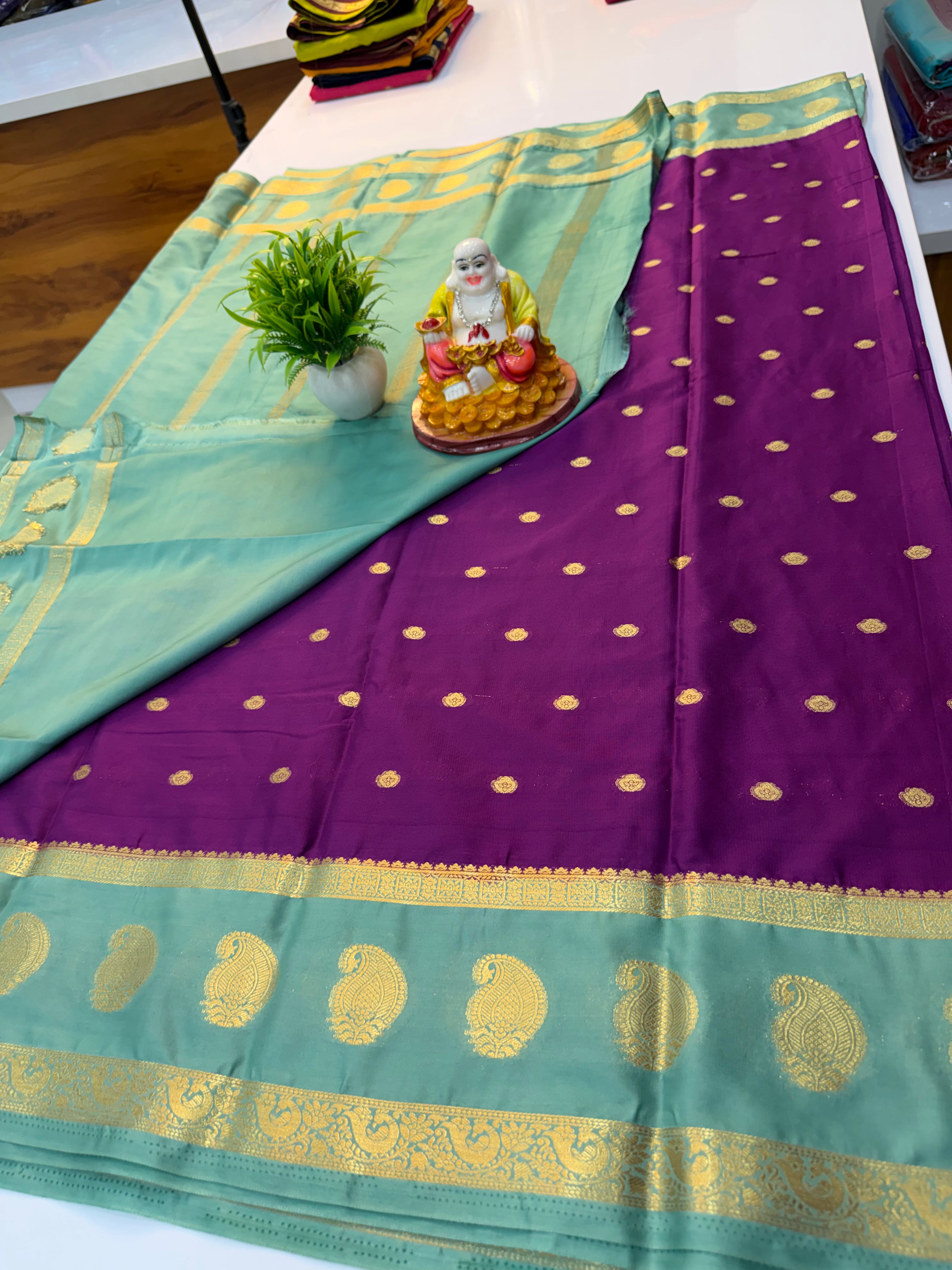 Premium crape silk saree with beuatiful buttas with mango bentex border