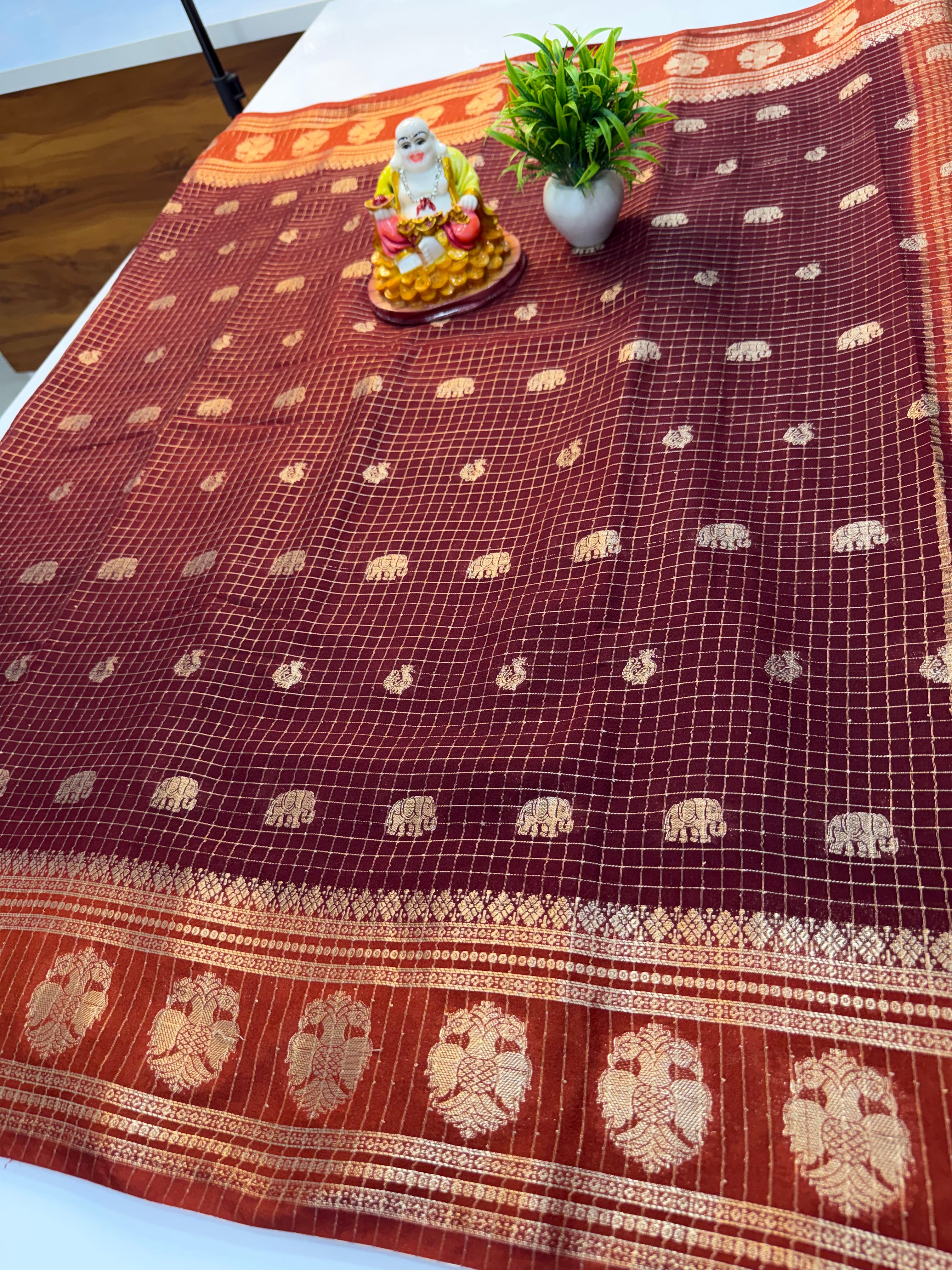 Mysore Crepe Silk Saree with Checks & Elephant-Peacock Buttas…….
