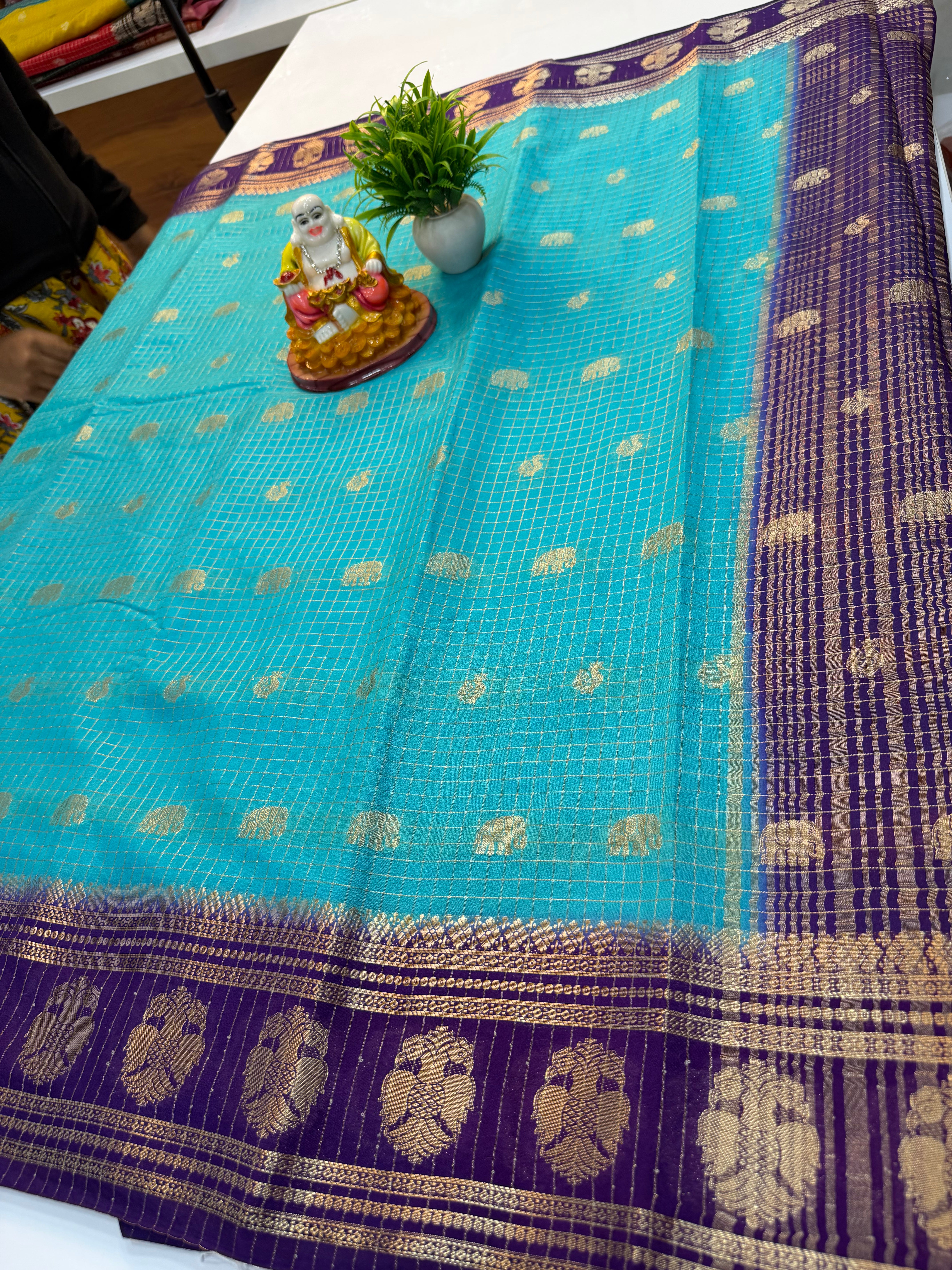 Mysore Crepe Silk Saree with Checks & Elephant-Peacock Buttas…….