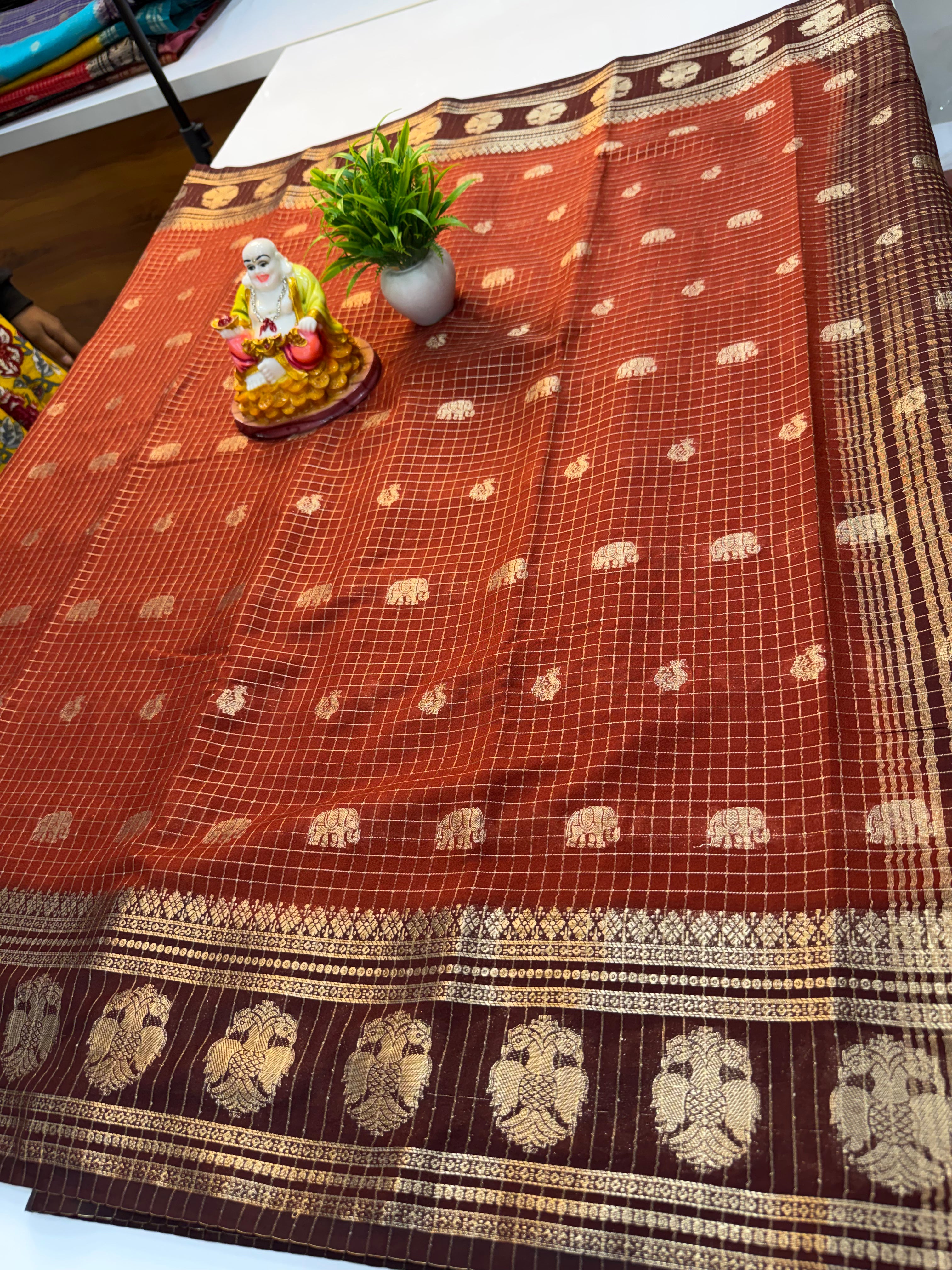 Mysore Crepe Silk Saree with Checks & Elephant-Peacock Buttas…….
