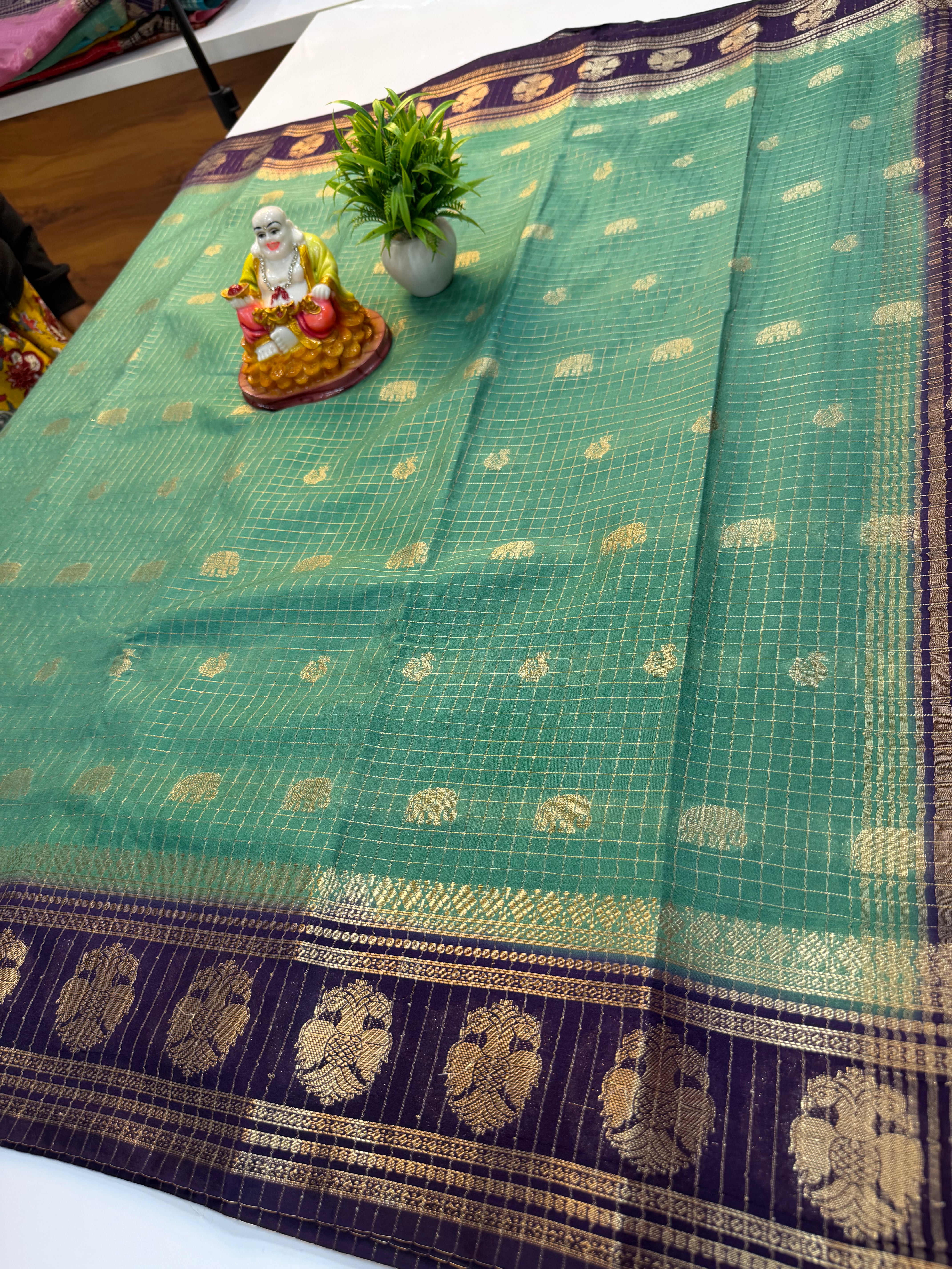 Mysore Crepe Silk Saree with Checks & Elephant-Peacock Buttas…….