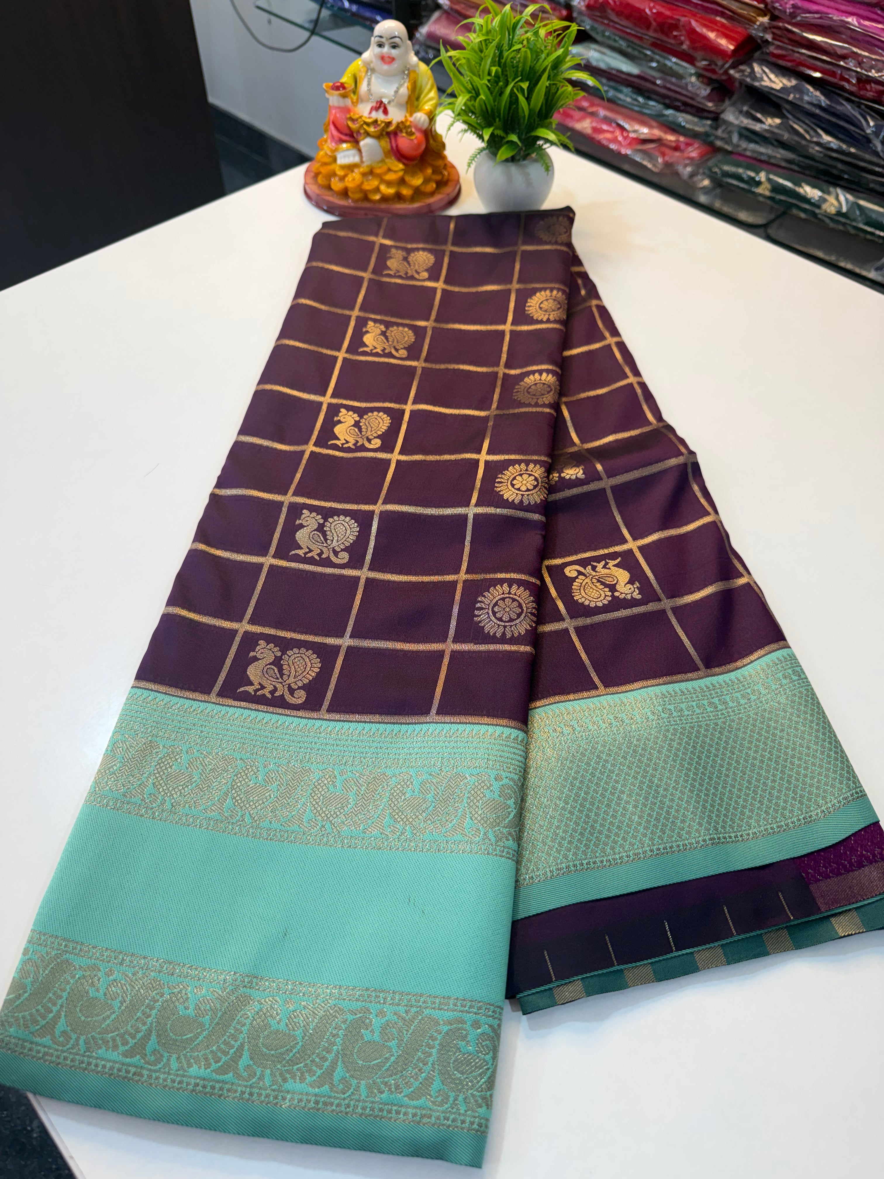 Semi Silk Saree with Checks & Peacock Buttas – Rich Pallu | Padmavathi Silks and Sarees  Product Description: