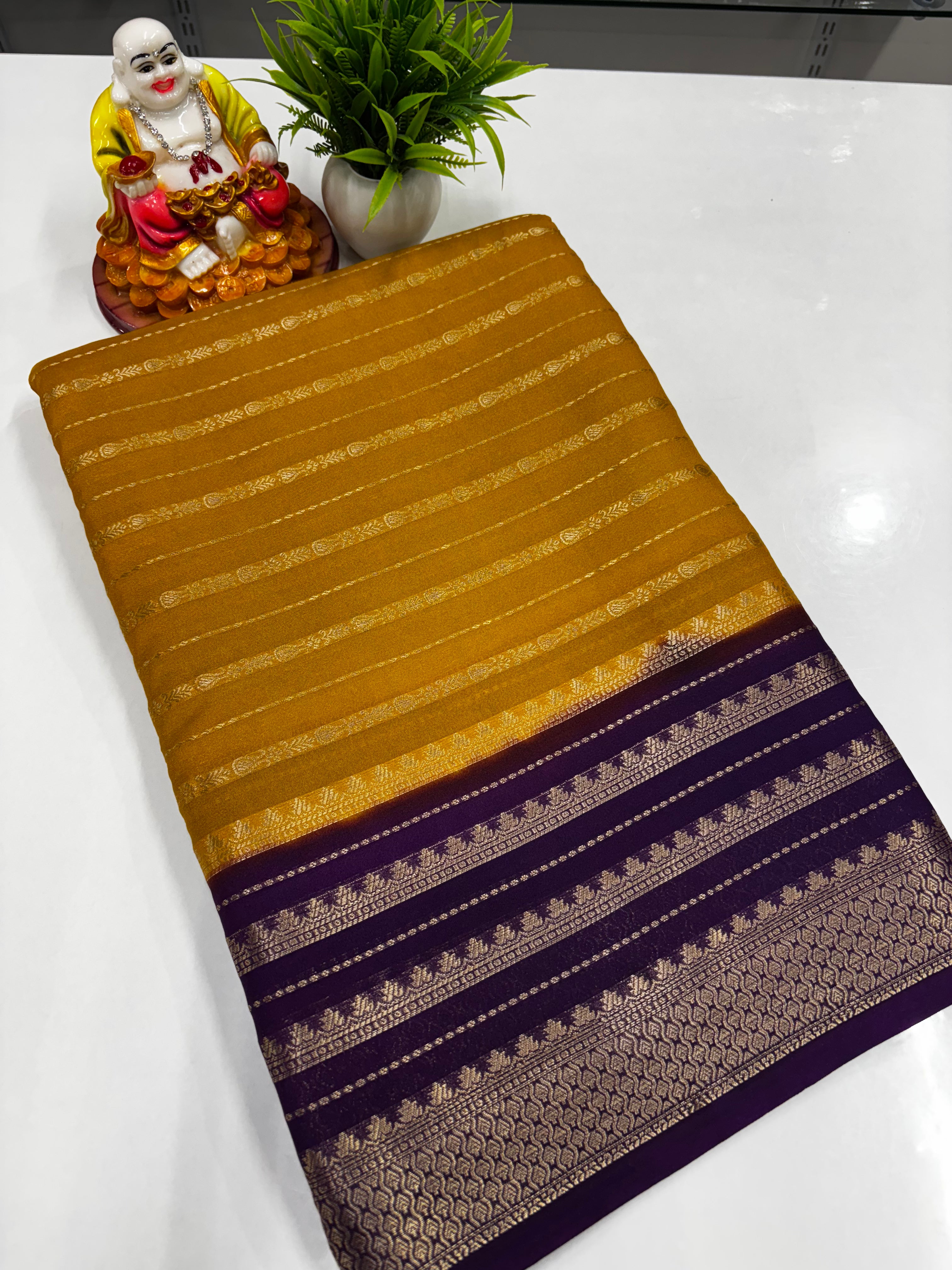Semi Crepe Saree featuring beautiful stripes and vibrant colors,