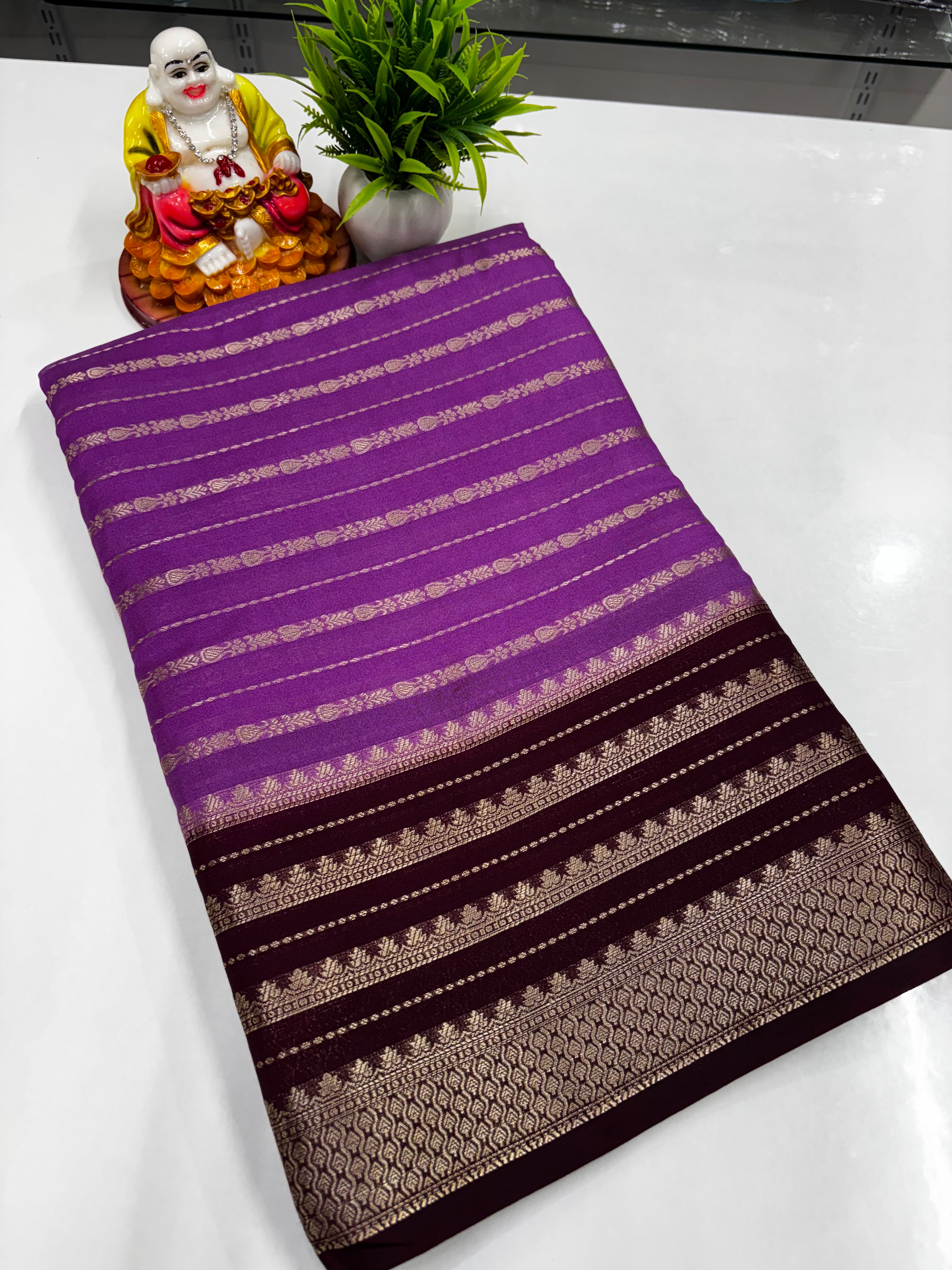 Semi Crepe Saree featuring beautiful stripes and vibrant colors,